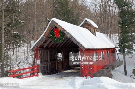 Red Wooden Covered Bridge In Winter High Res Stock Photo Getty Images