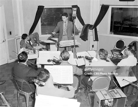 The Cbs Campbell Playhouse Featuring Orson Welles Seated At An Photo