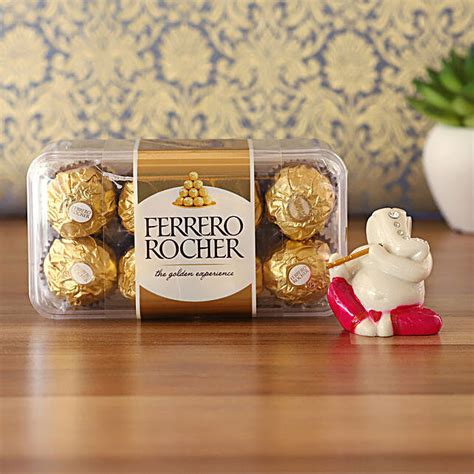 Buy Send Ferrero Rocher Serene Flute Ganesha Idol Combo Online Fnp