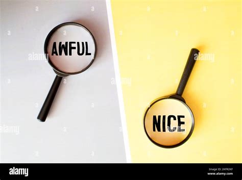 Awful and nice antonyms word on block. Concept Stock Photo - Alamy