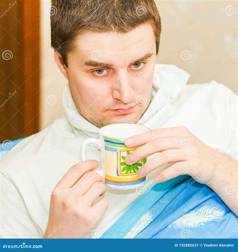 A Young Handsome Cold Man Covers His Mouth Stock Image Image Of