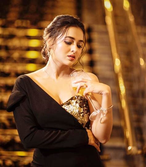 Tejasswi Prakash Looks Smoldering Hot In Thigh High Slit Black And Gold