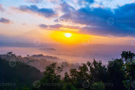 Sunrise over Merapi volcano and Borobudur temple, Indonesia 1177515 ...