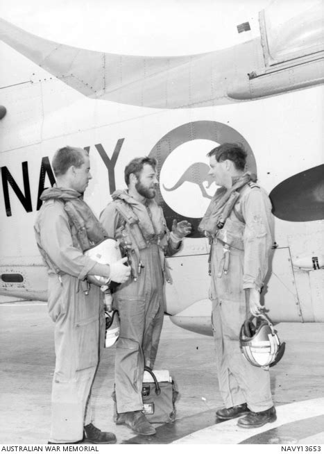 Three Fleet Air Arm Faa Members Pose Near The Roundel Of A Ran Fairey