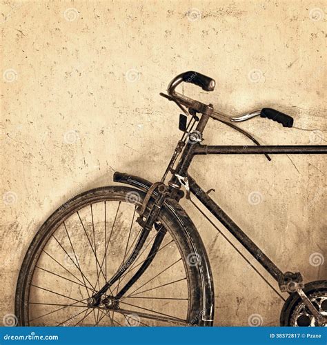 Old Rusty Bicycle On Grunge Wall Background Stock Image Image Of