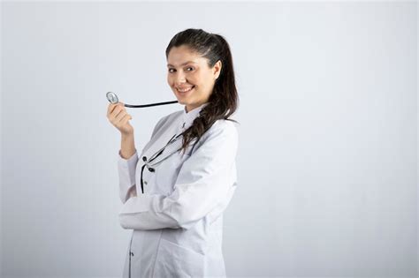 Premium Photo Beautiful Female Doctor In White Coat Posing With