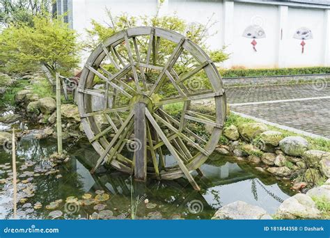 Wooden Water Wheel Spinning Stock Photo Image Of Green Colorful