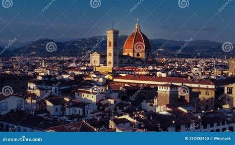 Aerial View of a Cityscape at Night Featuring an Array of Old Buildings ...