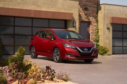 2018 Nissan Leaf vs. Tesla Model 3 | Comparison, Price, Range, Specs | Digital Trends