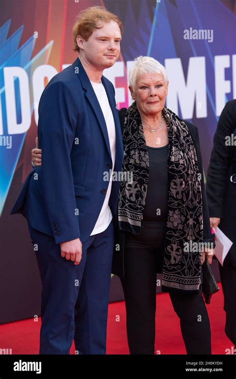 London, UK. Dame Judi (Judith) Dench and grandson Sam Williams at the ...