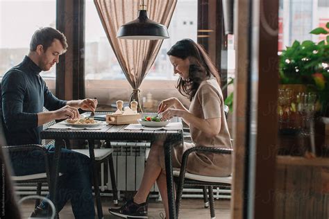 Couple At Restaurant Having Dinner By Stocksy Contributor Liliya