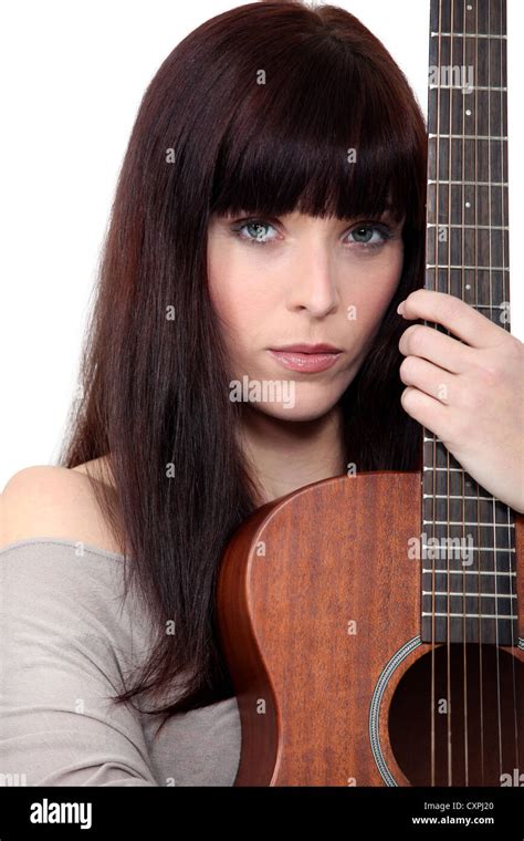 Woman Holding Acoustic Guitar Stock Photo Alamy