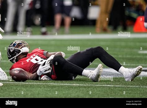 Atlanta Falcons Tight End Kyle Pitts 8 Lies On The Turf After A Hit