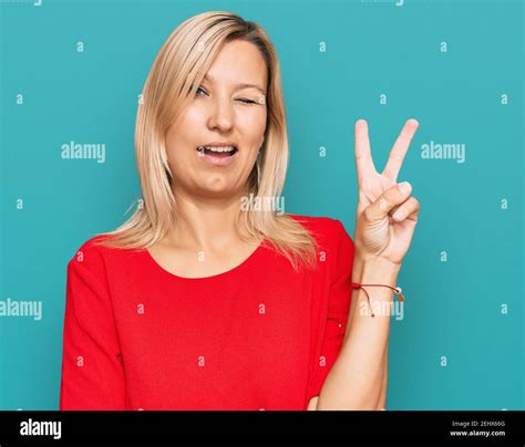 Middle Age Caucasian Woman Wearing Casual Clothes Smiling With Happy