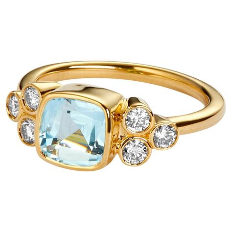 Syna Yellow Gold London Blue Topaz Emeralds Rubies And Diamond Ring