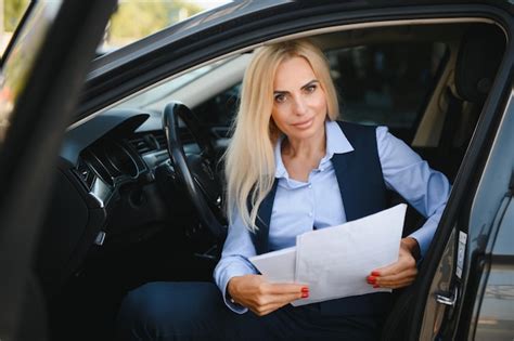 Premium Photo Portrait Of Business Elegant Middleaged Woman In Car