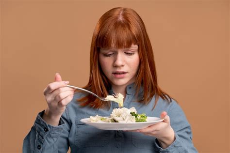 Free Photo Woman With Eating Disorder Trying To Eat Healthy