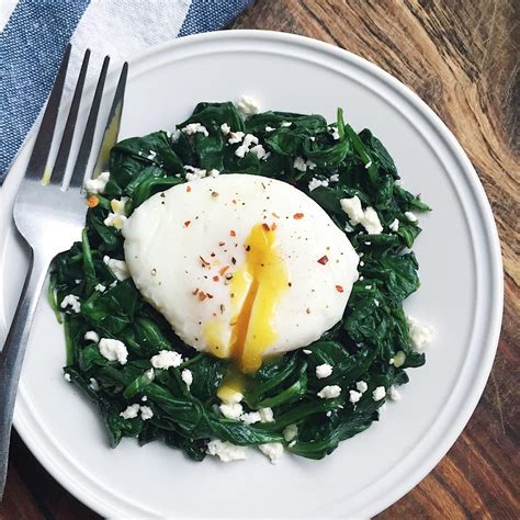 Poached Egg Over Garlic Spinach Feta Recipe The Feedfeed