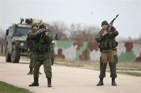 Ukraine and Russia Troops in Crimea's Belbek Airbase | TIME