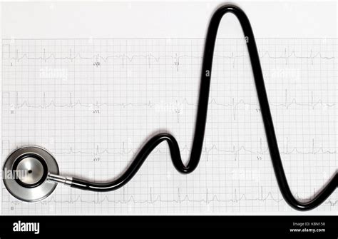 Stethoscope In The Shape Of Heart Beat On Electrocardiogram Stock Photo