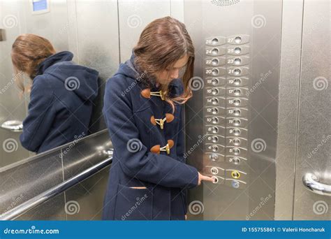 Young Teen Girl In Elevator Presses The Elevator Button Stock Image Image Of Buttons Moving