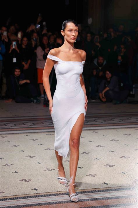 Bella Hadid Had A Dress Spray Painted Onto Her Naked Body At Coperni