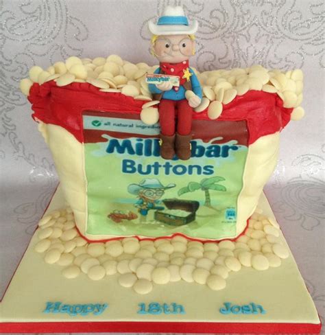 Milky bar button cake - Decorated Cake by silversparkle - CakesDecor