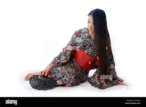 Japanese Lady Sitting On Floor High Resolution Stock Photography And