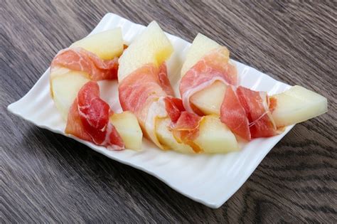 Premium Photo | Melon with prosciutto