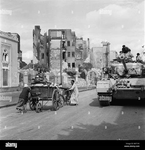 Suez Crisis 1956 Egyptian Refugees Remove Their Belongings In A Cart As