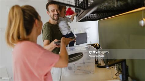 Unpacking Essentials In Our New Kitchen High-Res Stock Photo - Getty Images