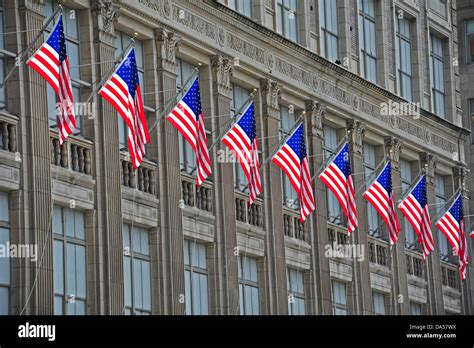 Us Flags On A Building Stock Photo Alamy