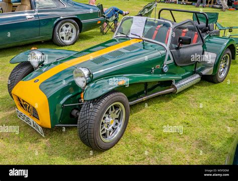 Side on view of a classic Lotus 7 kit car in British racing green and ...