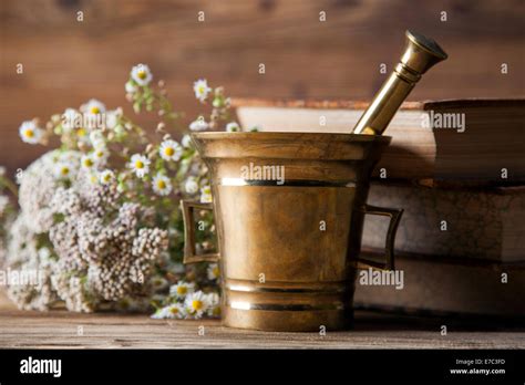 The Ancient Natural Medicine Herbs Medicines And Old Book Stock Photo