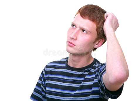 Confused Or Doubtful Young Man Scratching His Head And Looking Up Stock