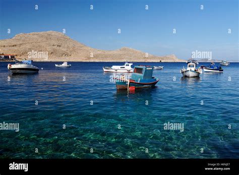 Fishing Boats In Harbour Village Of Emborio Chalki Island Near Rhodes