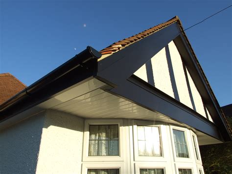 Installation Of Black Mock Tudor Upvc Fascias Soffits Barge Boards