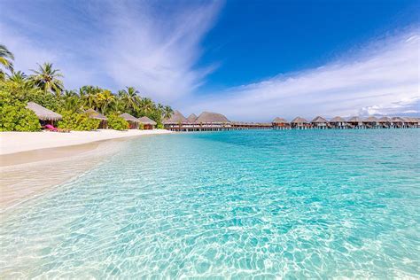 Tropical Beach With Water Bungalows Photograph By Levente Bodo Fine