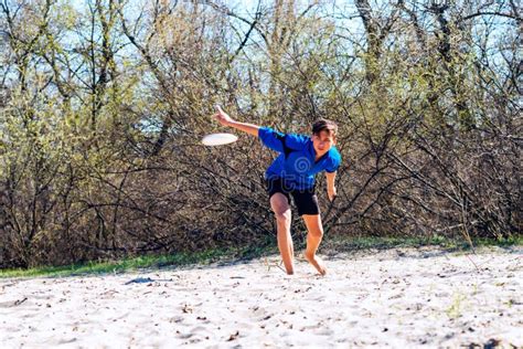 Multiracial Teenage Boy is Enthusiastically Throwing Frisbee Stock ...