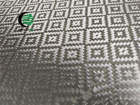 Patterned carbon fiber fabric