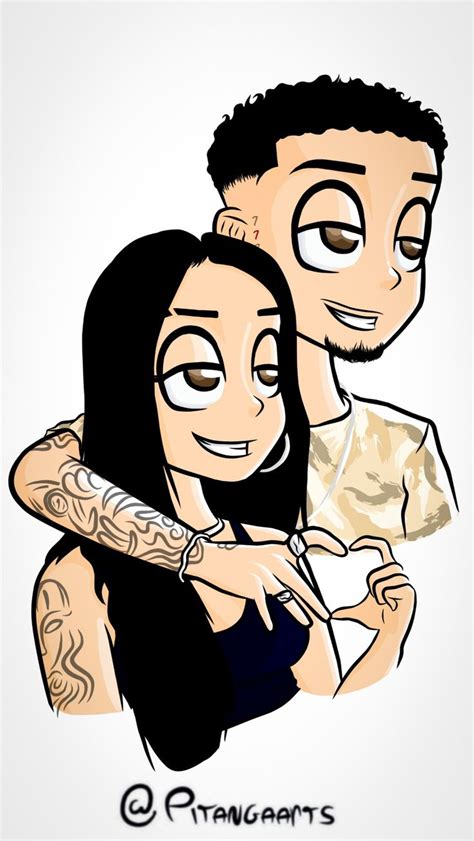 A Man And Woman With Tattoos On Their Arms One Holding The Other S