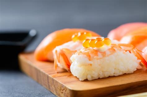 Premium Photo Ikura Salmon Roe On Prawn Sushi