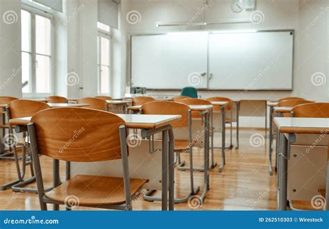 Selective Focus Image of Chairs and Tables in Empty School Classroom ...