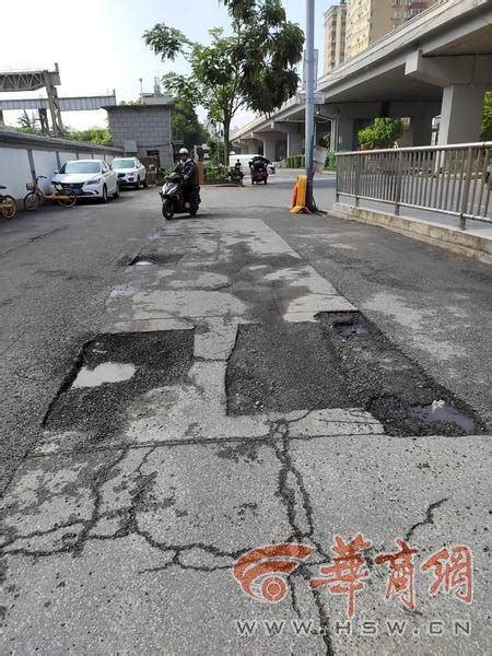 西二环与西斜路交汇处附近路面多处破损坑洼 居民盼尽快修缮地面周边莲湖区