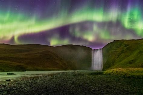 Aurora Borealis over Skogafoss waterfall in Iceland - Alexios Ntounas ...