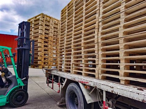 Wooden Pallets Stack On The Truck At The Freight Cargo Warehouse For