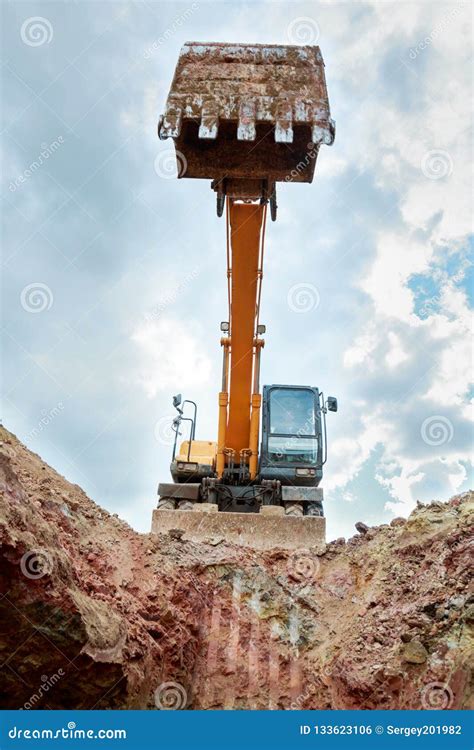 Excavator Digging a Trench for the Pipeline Stock Photo - Image of hole ...