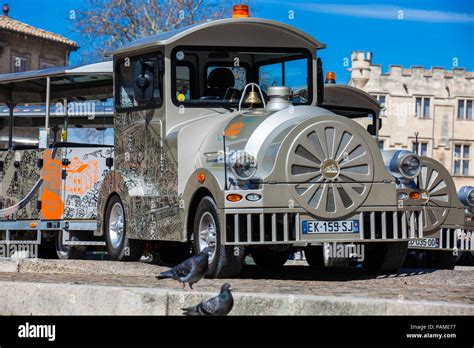 Touristic Train At The Square Below The Palace Of The Popes In Avignon