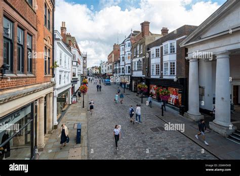 View Of Guildford High Street In The Town Centre Busy With People