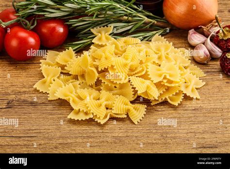 Raw Italian Durum Wheat Farfalle Pasta For Cooking Stock Photo Alamy